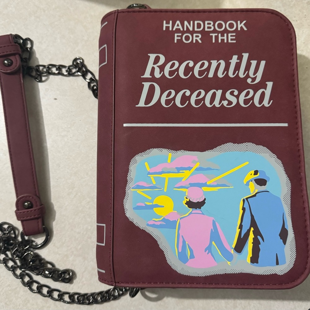 Beetlejuice purse with inside zipper.